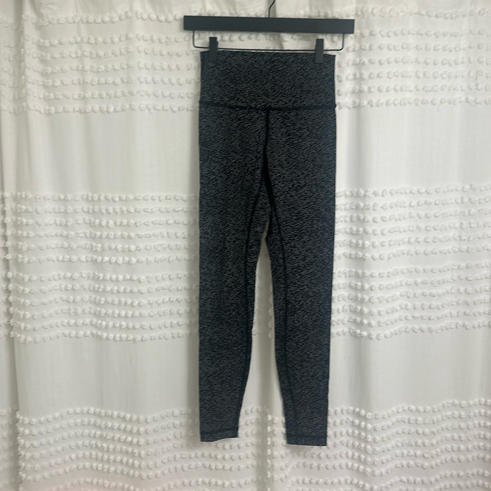 Running tight compression yoga pants from lululemon.